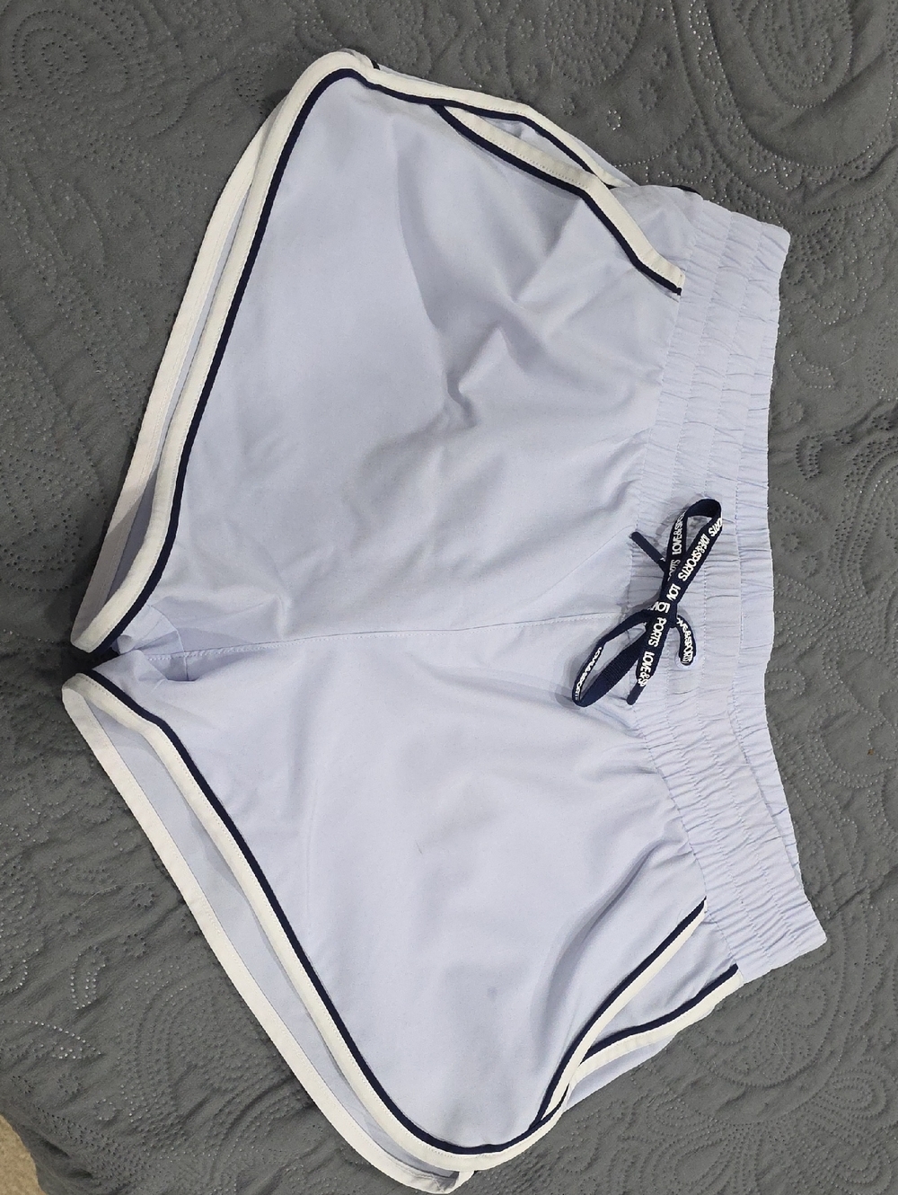 Light Blue Women's Athletic Shorts with Navy Trim and Branded Drawcord
